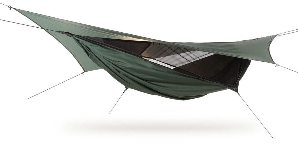 Photo of a forest green Expedition ZIP hammock set up against a white background.