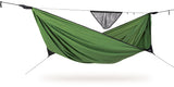 An bright green hammock suspended between two trees on a camping rope, with a small gray triangular ridgeline pocket hanging from the ridgeline, shown against a plain white background.