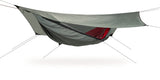 Photo of four season explorer hammock set up against a white background.  The hammock grey with a red interior.
