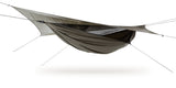 Photo of a bark colored Explorer Deluxe hammock set up against a white background. 