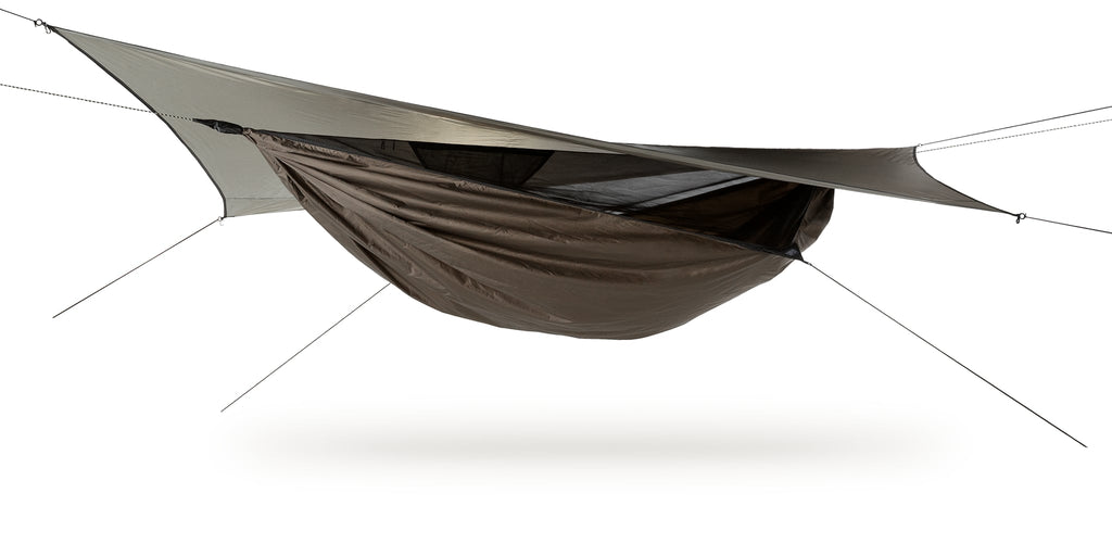 Photo of a bark colored Explorer Ultralite hammock set up against a white background.