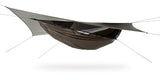 Photo of a bark colored Explorer Ultralite hammock set up against a white background.