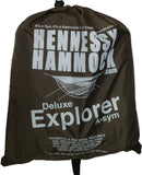 Photo of a brown Explorer Deluxe stuff sack with white printing.  Printed on the stuff sack is the Hennessy Hammock logo, an illustation of the hammock, the model name, and other technical information.